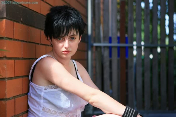 Freckle faced pixie Lucie pulls down her panties outside