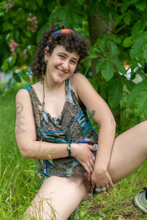 Playful furry girl Sophia B spreads her hairy pussy with her tampon in